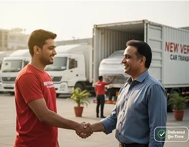 New Verma Car Transport team ensuring vehicle safety and timely delivery with a handshake